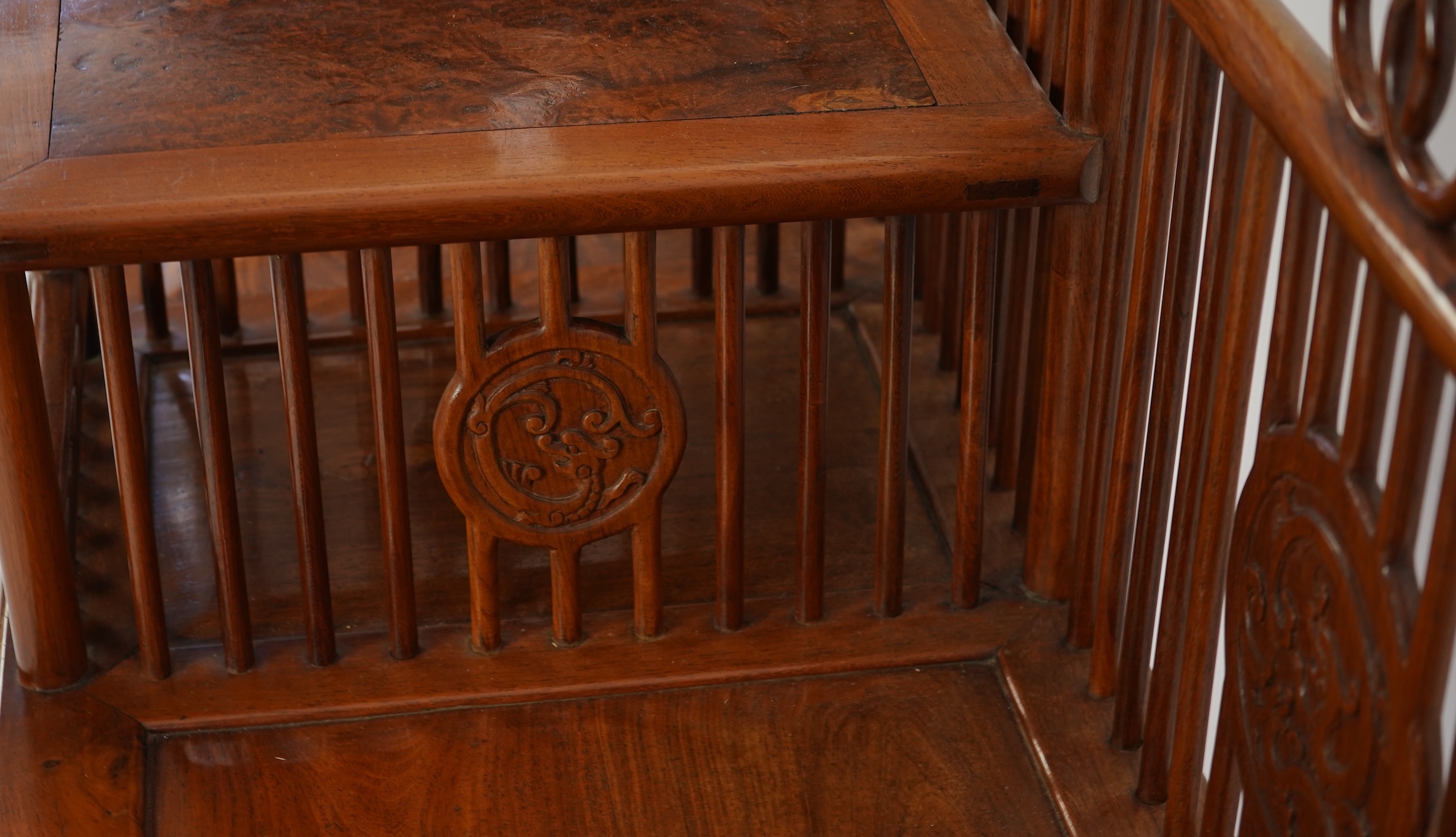 A Chinese hardwood and burrwood inset spindle-back bench, early 20th century